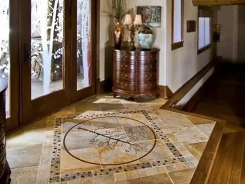 A tile floor with a compass on it