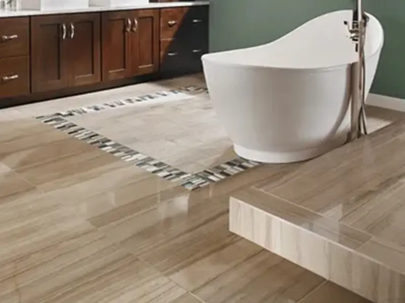 A bathroom with wood floors and tile on the floor.