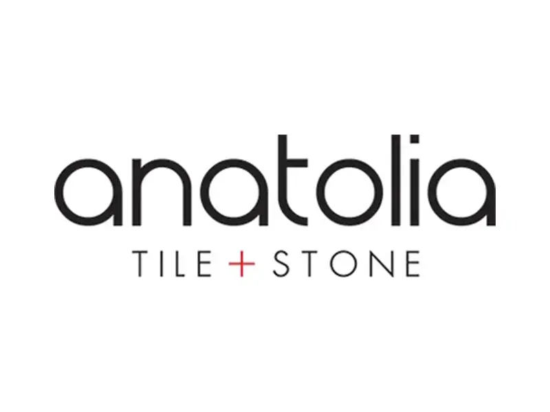 A logo of anatolia tile and stone