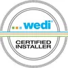 A wedi certified installer seal is shown.